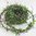 5,4m Teeblatt Girlande mit Beeren Wurzeln - grün - Draht Deko Buchsbaum Girlande